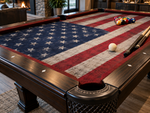 American flag custom pool table felt shown on a traditional dark wood billiards table in a luxury game room with bar seating and warm lighting.